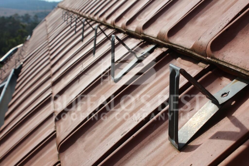 How To Prevent Snow And Ice From Sliding Off A Roof 1 Install Snow Guards